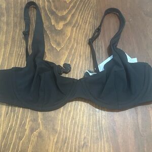 Bra like Bikini top. Low cut.